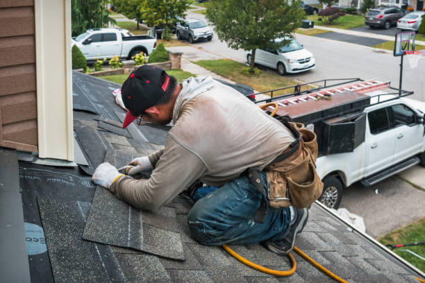 Professional Gutter Repair And Installation technician working in West Orange, TX